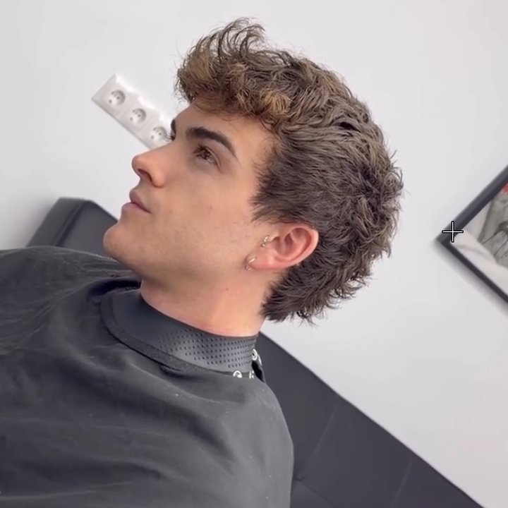 Corte de rizos con degradado en Paradise Barber